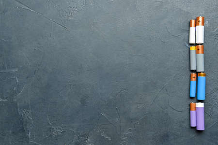 Alkaline batteries on black backgroundの写真素材