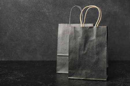 Shopping bags on dark background. black friday sale