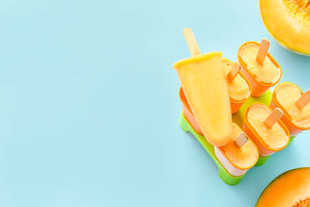 Tasty melon on blue backgroundの写真素材