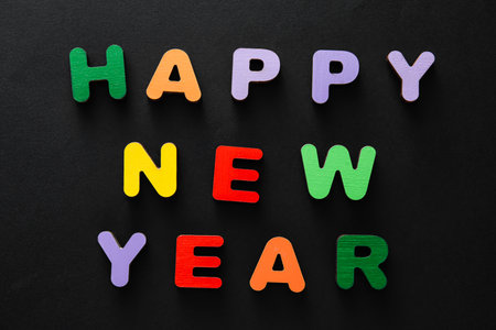 Text HAPPY NEW YEAR on black backgroundの写真素材
