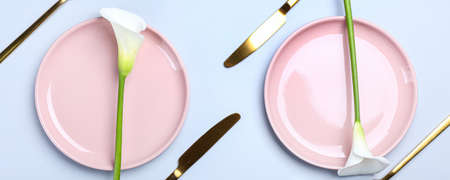 Beautiful table setting with calla lilies on light background, top view