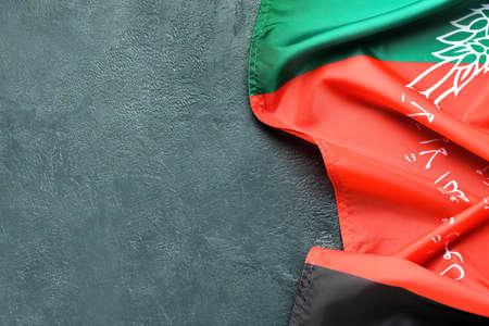 Flag of Afghanistan on dark backgroundの写真素材