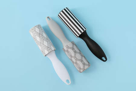 New lint rollers on blue backgroundの写真素材