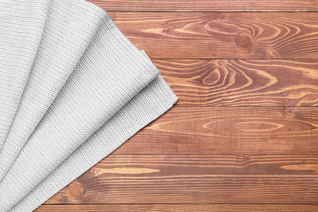 New napkin for picnic on wooden background