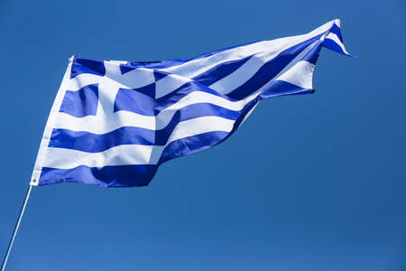 National Greece flag against blue sky
