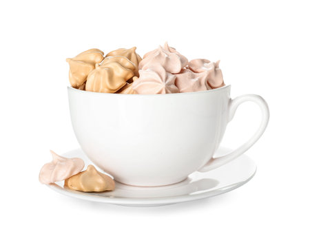 Cup with tasty meringue on white backgroundの写真素材