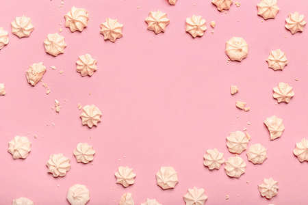 Frame made of sweet meringue on color backgroundの写真素材