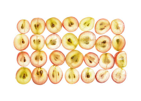 Ripe cut grapes on white backgroundの写真素材