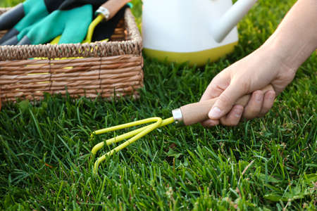 woman working with rake in garden