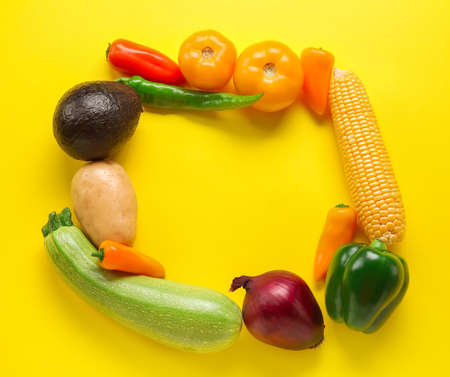 Frame made of vegetables on color background. Vegan Dayの写真素材