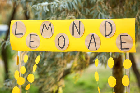 Sign with word LEMONADE outdoorsの写真素材