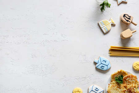 Different symbols of Hanukkah on light backgroundの写真素材