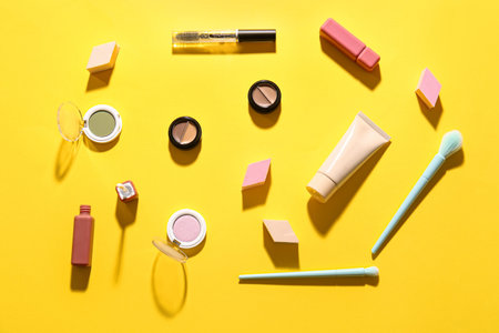 decorative cosmetics on yellow backgroundの写真素材