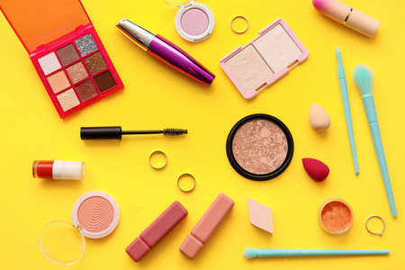 decorative cosmetics on yellow backgroundの写真素材