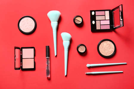 decorative cosmetics on red backgroundの写真素材