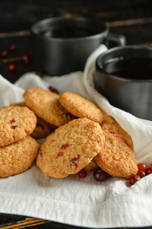 Delicious cranberry cookies on table, closeupの写真素材