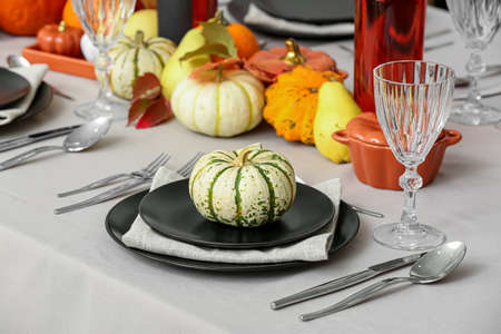 Stylish autumn table setting in restaurant