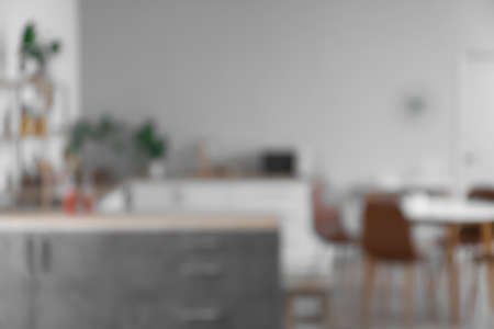 Interior of modern light kitchen, blurred viewの写真素材