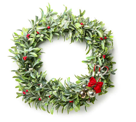 Beautiful mistletoe wreath on white backgroundの写真素材
