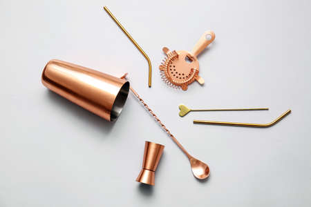 Copper bartender tools on gray backgroundの写真素材