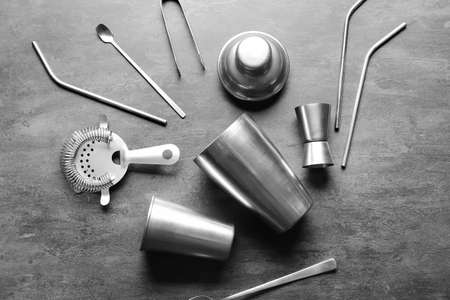 Set of bartender utensils on gray backgroundの写真素材