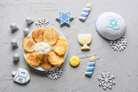 Symbols of Hanukkah with Christmas decor on grunge backgroundの写真素材