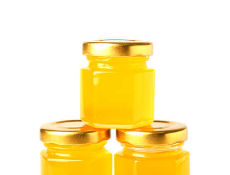Jars with honey on white background, closeupの写真素材