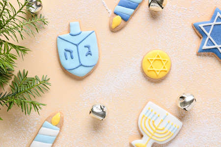 Cookies for Hanukkah celebration and Christmas decor on light backgroundの写真素材