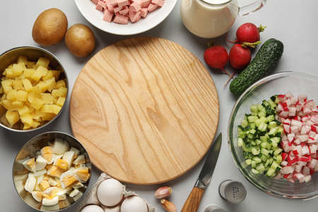 Ingredients for preparing tasty okroshka on gray background, closeupの写真素材