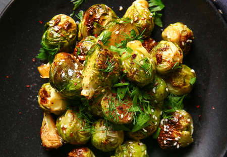 Plate with tasty roasted Brussels cabbage, closeupの写真素材