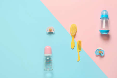 Different accessories for baby boy and girl on color backgroundの写真素材