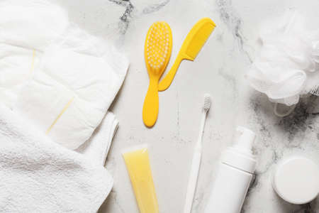Different bath accessories for baby on light marble backgroundの写真素材