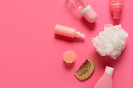 Different bath accessories for baby on pink backgroundの写真素材