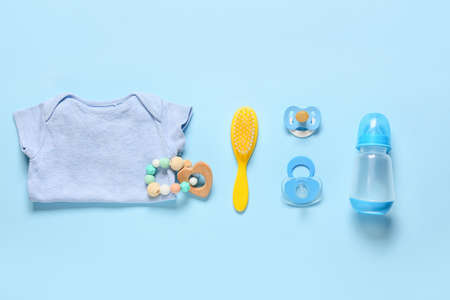 Cute accessories for baby boy on blue backgroundの写真素材