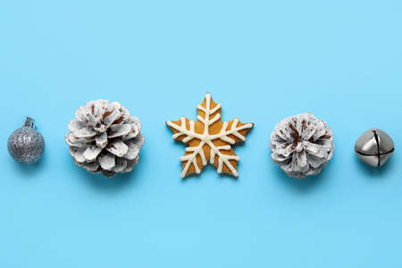 Tasty cookies and Christmas decorations on blue backgroundの写真素材
