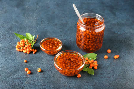 Healthy rowan berry jam on dark backgroundの写真素材
