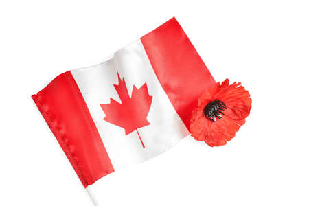 Poppy flower and flag of Canada on white background. Remembrance Dayの写真素材