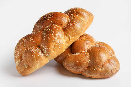 Traditional challah bread on white background. Shabbat Shalom