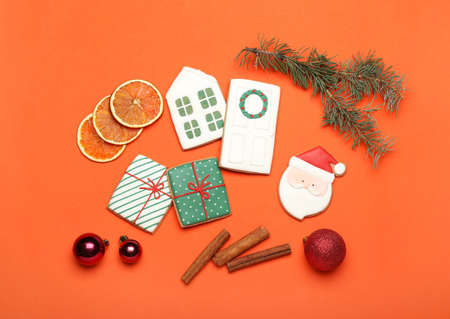 Delicious Christmas cookies with decor on color backgroundの写真素材