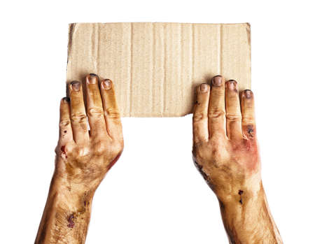 Hands of zombie with empty paper sheet on white backgroundの写真素材