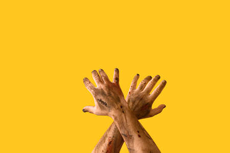 Hands of zombie on color backgroundの写真素材
