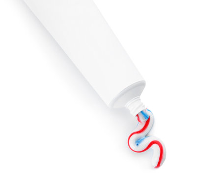 Tube with squeezed toothpaste on white background, closeupの写真素材
