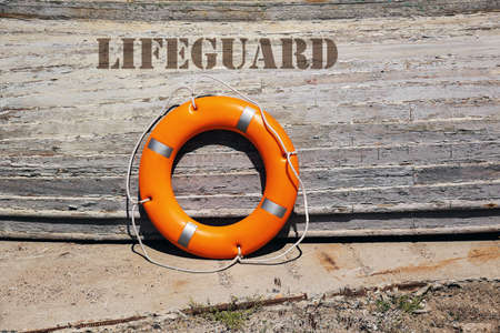 Boat with lifebuoy ring on berthの写真素材