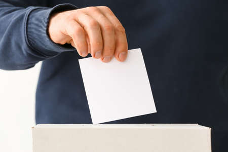 Man voting at polling station