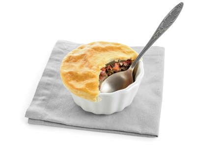 Tasty vegetable pot pie on white background
