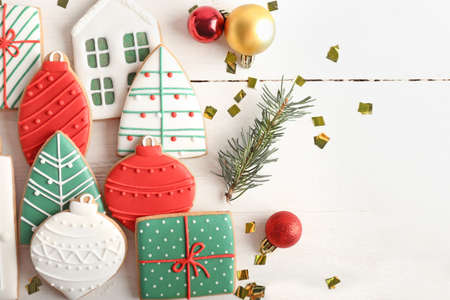 Beautiful Christmas cookies on light wooden backgroundの写真素材