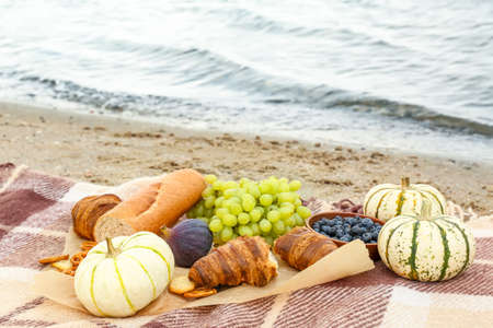Delicious food on sand beach near waterの写真素材