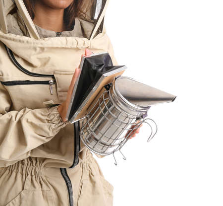 Female beekeeper on white background