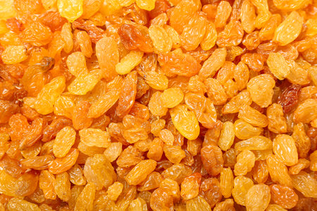 Sweet dried raisins as backgroundの写真素材