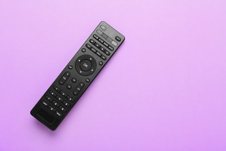 Modern TV remote control on color backgroundの写真素材